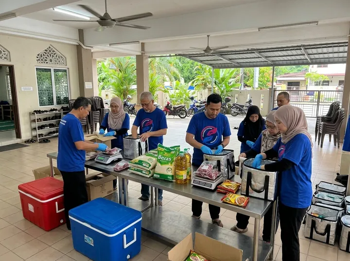 Preparing packaged meat and grocery supplies.